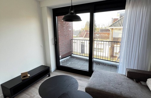 Goirle Apartment | Elegant stay with parking, WiFi, and contemporary furnishings near local shops. Sleeps four