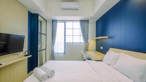 Pondokcina Apartment | Elegant Studio at Evenciio Margonda Apartment By Travelio