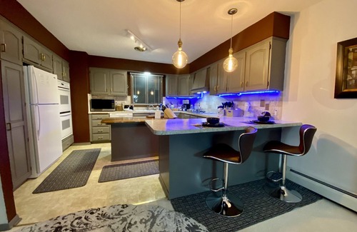 Fort Morgan House | Elegant Three Bedroom Home with Patio and Fireplace