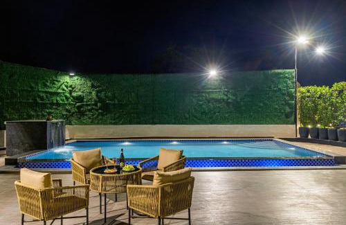 New Delhi Villa | ELIVAAS Ibiza 4 BHK Farmhouse with Pvt Pool, Garden & Indoor Bar