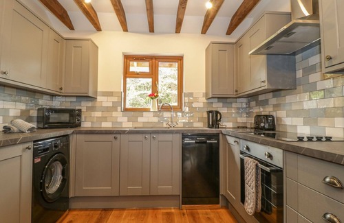 Old Cleeve Cottage | ELM LODGE, family friendly, with hot tub in Washford