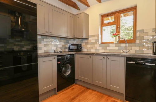 Old Cleeve Cottage | ELM LODGE, family friendly, with hot tub in Washford