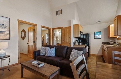 Dover House | Embrace lakeside serenity at this cozy Dover Bay bungalow, just steps from the water, perfect for couples or families seeking peaceful Idaho charm.