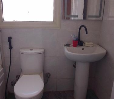 Shurtah al-Dakhlah Apartment | Empty room without furniture in an apartment