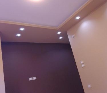 Shurtah al-Dakhlah Apartment | Empty room without furniture in an apartment