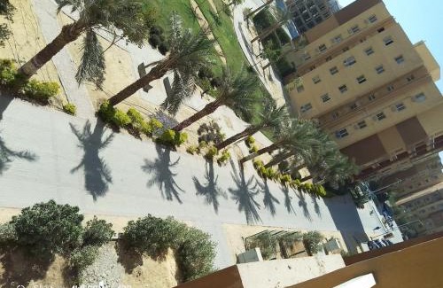Shurtah al-Dakhlah Apartment | Empty room without furniture in an apartment