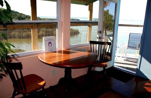 Burnet House | Enchanting Room Rental with Stunning Lake Views near Houston, Texas