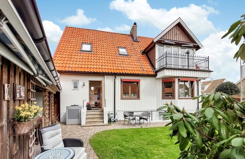Hoganas House | Enjoy a cozy vacation in this vacation home near the beach.
