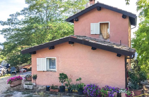 Vallebona House | Enjoy a fantastic view of the countryside and the sea in the horizon.