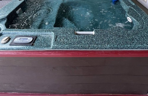 Lockhart House | Enjoy a game of a pool or a relaxing soak in the jacuzzi at the hangout!