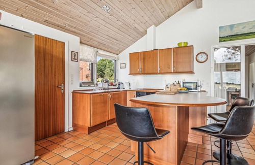 Hojer House | Enjoy a great view of the countryside from the terrace of this vacation home.