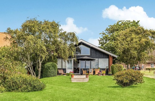 Hojer House | Enjoy a great view of the countryside from the terrace of this vacation home.