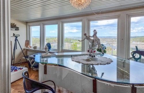 Vastra Frolunda House | Enjoy a wonderful view of the archipelago in this comfortable vacation home with sauna.