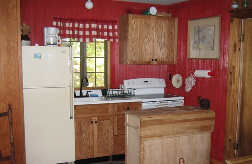 Silver Bay Cottage | Enjoy an incredible view while perched above the water