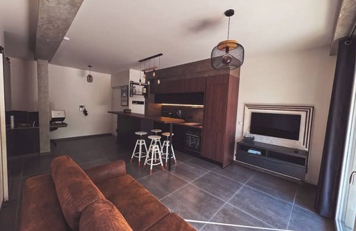 L'Ile-Saint-Denis Apartment | Enjoy modern comfort in our apartment with a sunny terrace