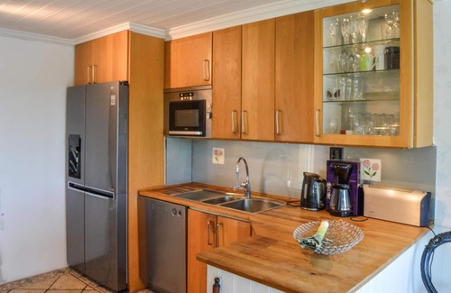 Dalaro House | Enjoy relaxing baths in the jacuzzi with sea view in this vacation home.