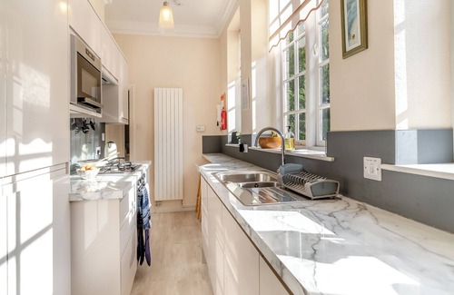 Waterhead Cottage | Enjoy stunning fell views from this grand apartment.