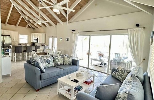 Providenciales Villa | Enjoy the oceanview and relax poolside. Steps to World Famous Grace Bay Beach.