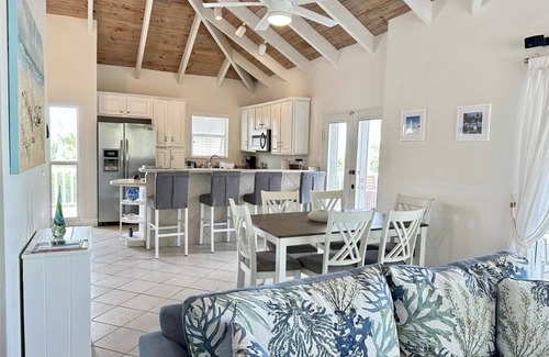 Providenciales Villa | Enjoy the oceanview and relax poolside. Steps to World Famous Grace Bay Beach.