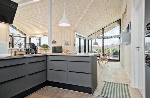 Krejbjerg House | Enjoy the peace and quiet and the lake view in this charming holiday home in an idyllic location.