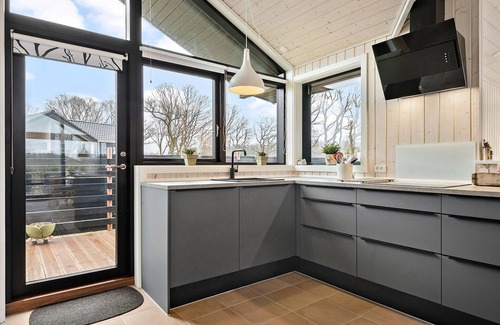 Krejbjerg House | Enjoy the peace and quiet and the lake view in this charming holiday home in an idyllic location.