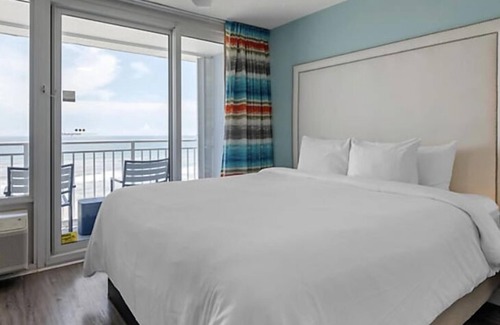 Daytona Beach Shores Resort | Enjoy the salty air and sea breezes from your oceanfront balcony.