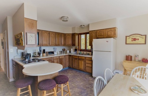 Five Islands House | Enjoy the stunning views while relaxing on the deck at East Ledge Cottage
