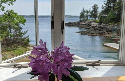 Five Islands House | Enjoy the stunning views while relaxing on the deck at East Ledge Cottage