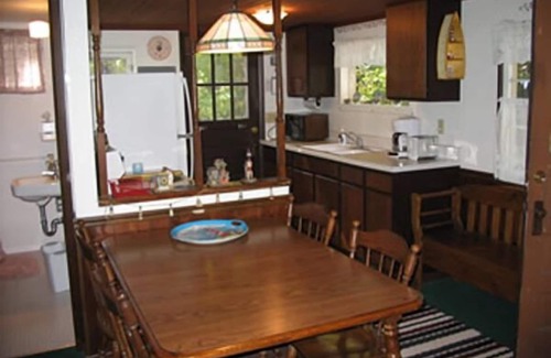 Baileys Harbor Cottage | Enjoy the view at this quaint lakefront cottage!