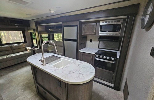 Clark Fork House | Enjoyable RV with AC, heat, water, in charming Clark Fork. Pet friendly.