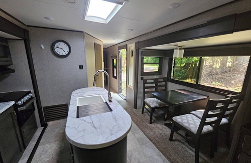 Clark Fork House | Enjoyable RV with AC, heat, water, in charming Clark Fork. Pet friendly.