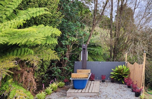 Waitoki Cabin | Escape to a Rustic Modern Farm Cabin with Outdoor Bath