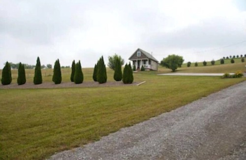 Dundee Cottage | Escape to our romantic stone cottage by a pond overlooking Amish country