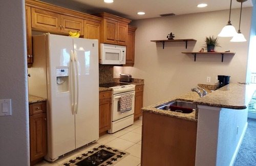 Palmetto Condo | ESCAPE TO SUN AND BLUE SKYS AND SEA BREEZES. LOWER PRICES FOR LONGER STAYS