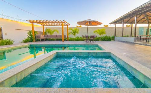 Setor Lagoa Quente House | Espaço Premium: 5 Quartos, Piscina e Sinuca