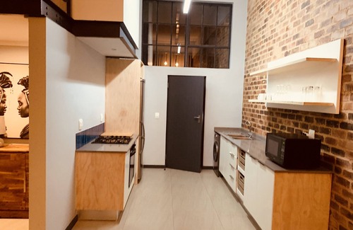 Greater Johannesburg Metropolitan Area Apartment | Exchange Loft apartment- Braamfontein