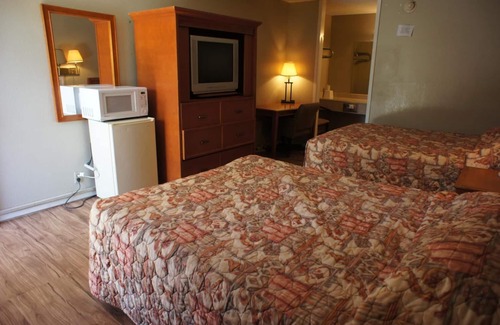 Orange Hotel | Executive Inn & Suites
