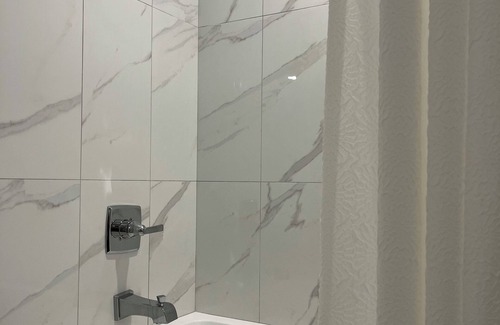 West Hillhurst House | Executive inner city basement suite step to Foothills Hospital, UofC