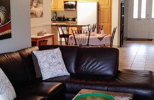 Okanagan-Similkameen Condo | Executive Lakeshore Condo bordering the lake, the KVR trail and Lions Gardens.