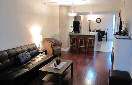 International District Condo | EXECUTIVE LUXURY DOWNTOWN CONDO LOCATED BY THE OLD PORT WITH FREE GARAGE PARKING