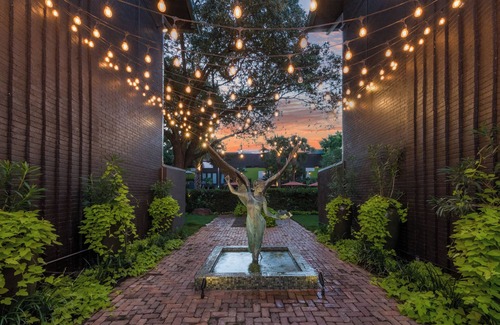 Lower Greenville Condo | Expansive 2-bed loft with fireplace, full kitchen, smart TVs, and access to an award-winning courtyard & resort pool.