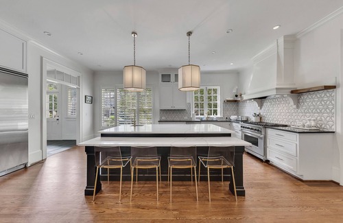 North Buckhead House | Expansive 5BR/7BA home in Buckhead, just 9.8 miles from Mercedes-Benz Stadium. Features a chef’s kitchen, in-law suite, ensuite baths, basement lounge, office, gym, and screened patio. Ideal for families, groups, or traveling fans.