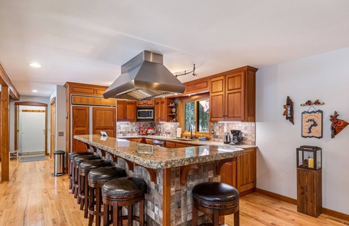 Clark Fork House | Expansive Riverfront Lodge with Dock, Game Room, Bar & Spacious Deck!