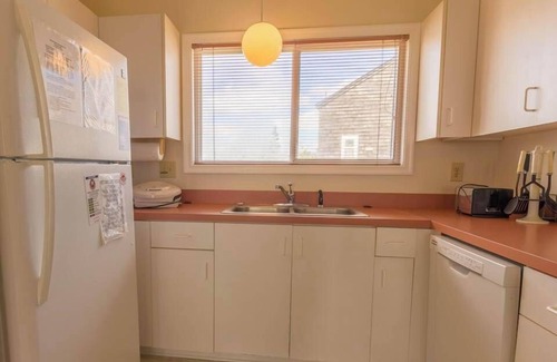 Ocean Sands House | Experience coastal charm at 1838 - Paradise Suite, a spacious 2-bedroom condo in Corolla, NC