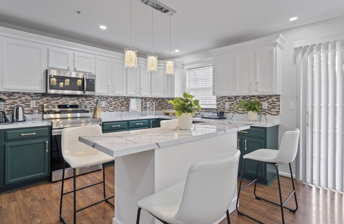 Owings Mills House | Experience Elevated Comfort: Luxe Breeze Townhouse.