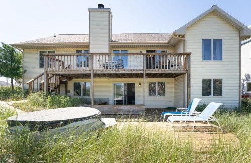Spring Lake House | Experience lakeside luxury at Sunset Cove, a spacious 5-bedroom home