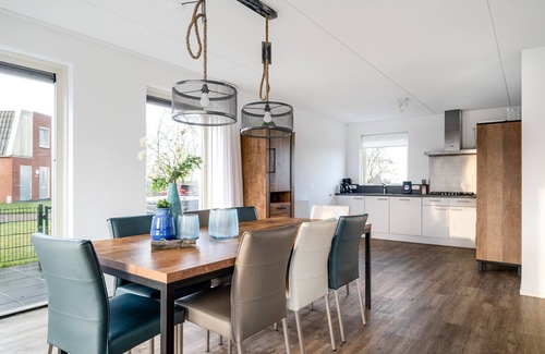 Akkrum House | Experience the ultimate luxury in our Sneekermeer 8 home, complete with an outdoor spa and a private jetty exclusively for you.