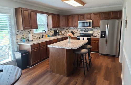 McLeansville House | Experience the warmth of a charming home that offers a serene view.