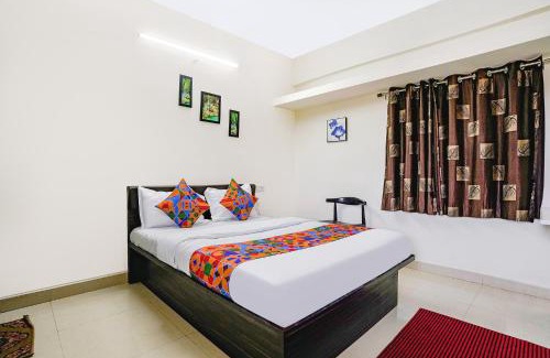 Pune Hotel | FabHotel Komfort Inn - Nr Twin Tower
