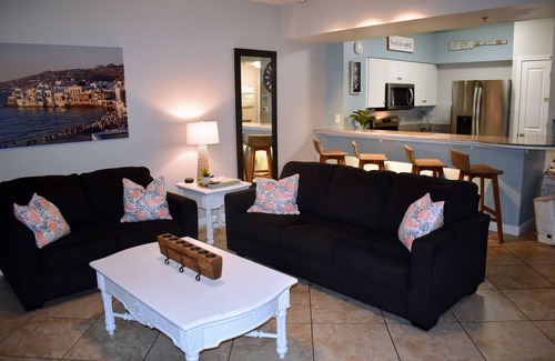 Upper Grand Lagoon Condo | FALL BREAK DEALS PLUS GULF VIEWS, BEACH CHAIR SERVICE AND PREMIER PARKING!